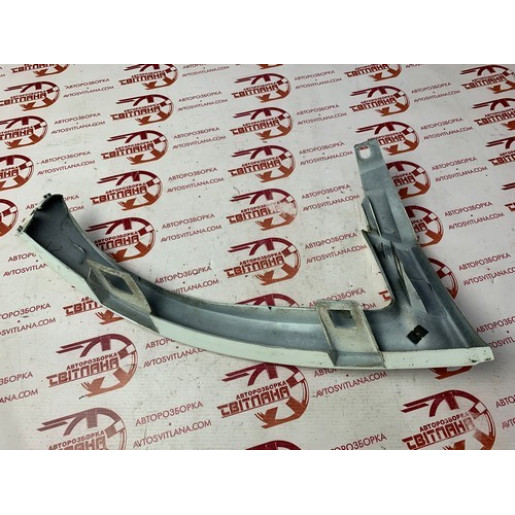Накладка под фару левая Fiat Doblo 2006- 735390978
